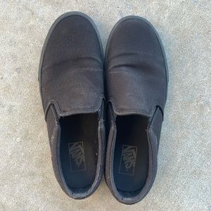 VANS BLACK SLIP ONS